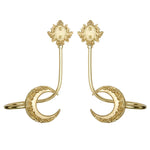 Boucles d'oreilles dorées ornées de motifs floraux et de formes géométriques.