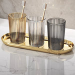 verres dents moderne élégants vert olive doré gris fumé rayures verticales transparents accesoires salle