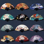 éventail traditionnel artisanal peinture artistique motifs floraux ruban décoratif couleurs vives
