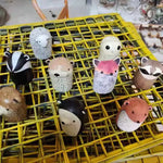 cloches décoratives animaux ours renard hibou motifs poils plumes artisanal extérieur