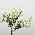 décoration intérieure bouquet artificiel feuilles vertes fleurs blanches jaunes roses naturel salon jardin