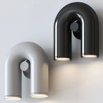 lampes murales modernes bleu turquoise noir blanc cassé rouille sculpturales éclairage quotidien minimaliste fixées