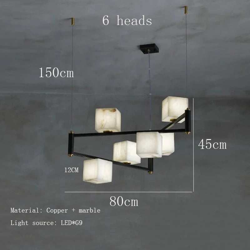 suspension lumineuse moderne marbre noir blanc or rose fixée câbles chambre salon