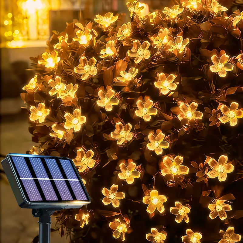 guirlande lumineuse solaire fleurs blanches bleues moderne extérieure noël décoration mariage festives