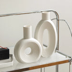 vases blancs modernes céramique rondes lignes horizontales décoration intérieure simple