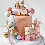 décoration gâteau anniversaire nounours ballons étoiles arc ciel pastel enfants festif