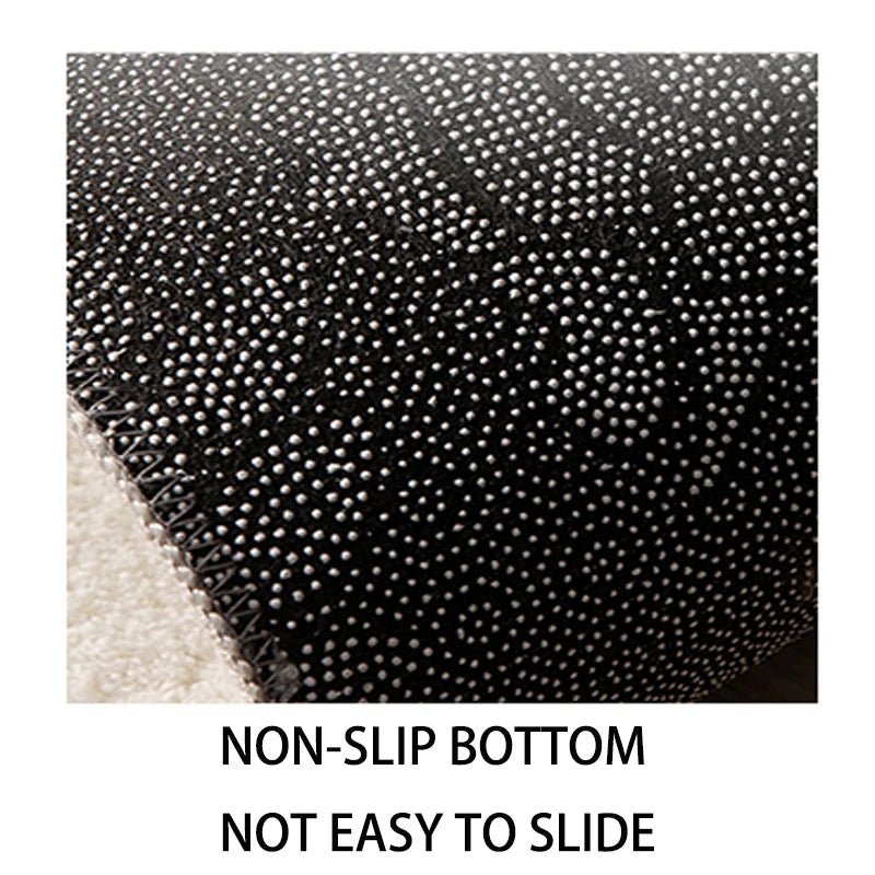 Cette image montre un fond texturé composé de petits points noirs, indiquant qu'il s'agit d'un revêtement antidérapant qui ne glisse pas facilement.