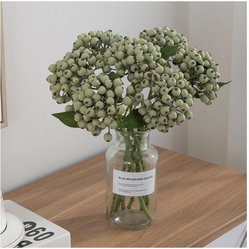 décoration intérieure bouquets artificiels baies feuilles vertes rouges orangers naturels