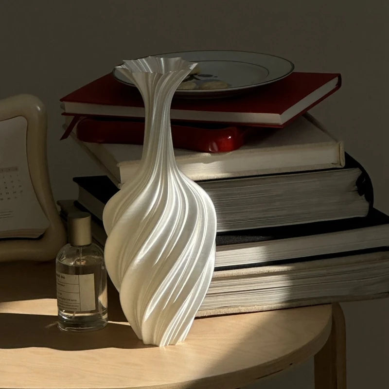 vase moderne décoration intérieure vase texturé noir fleurs artificielles calendrier cadre photo livres parfum
