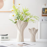 vase céramique texturé fleurs séchées feuilles vertes intérieur moderne minimaliste