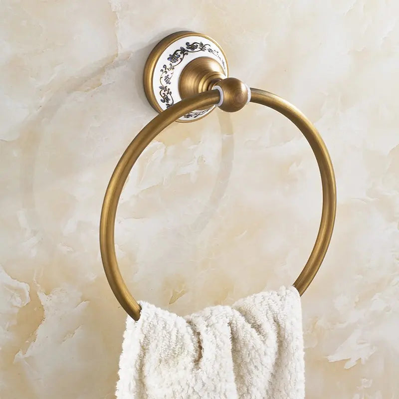 accessoires salle bain or motif floral classique porte serviettes brosse toilette porte sèche cheveux