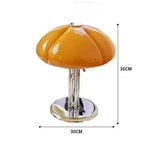 lampe table moderne orange chrome ombrelle fixée base plate câble électrique