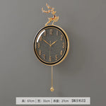 horloge murale moderne or bleu cerf décoration festive salon round métal doré