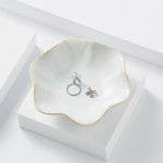 assiettes bijoux rose clair blanc bleu clair texture marbrée moderne élégant opacité