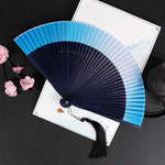 éventail pliant traditionnel vert foncé noir marron clair décoration mariage accessoire fête parfumé chinois