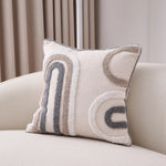taies d'oreiller bohèmes géométriques texturées coussins décoratifs modernes pompons beige gris doré blanc