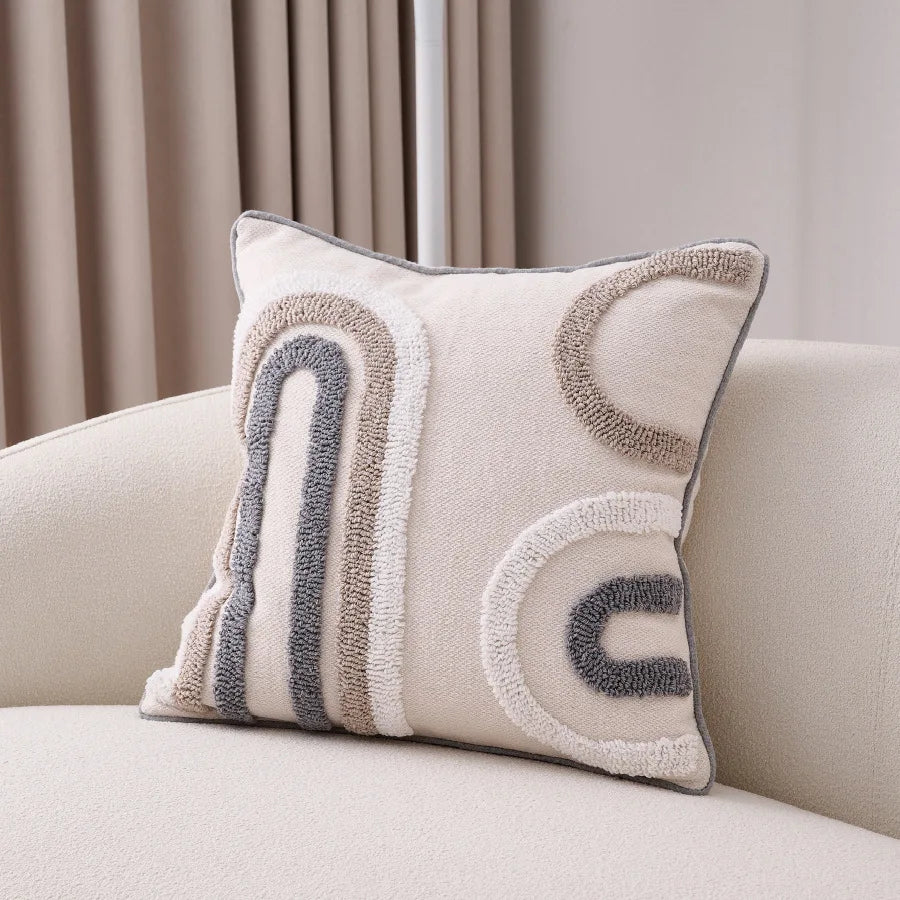 taies d'oreiller bohèmes géométriques texturées coussins décoratifs modernes pompons beige gris doré blanc