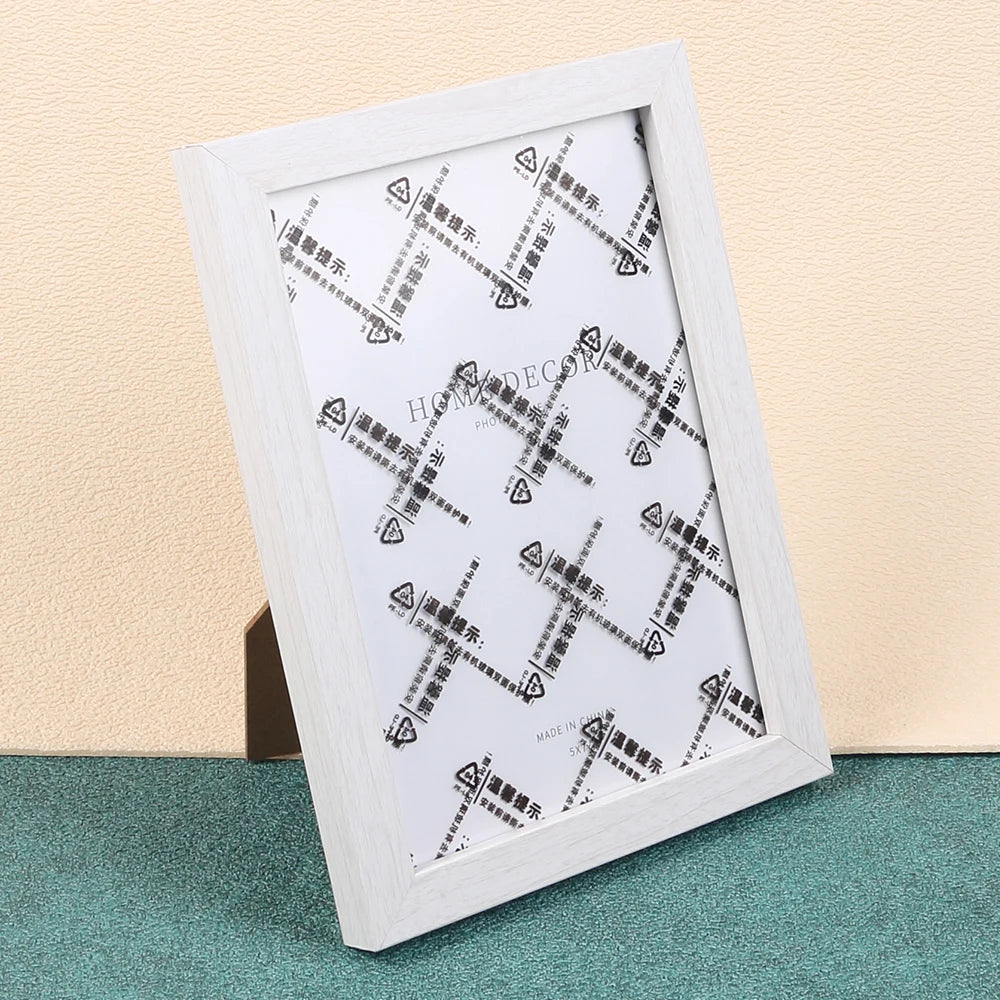 cadre photo bois blanc minimaliste rectangle fixations métalliques transparent affiche health photo noir blanc