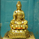 statue bouddhiste dorée or relief floral socle octogonal inscriptions chinoises traditionnelle protection maison