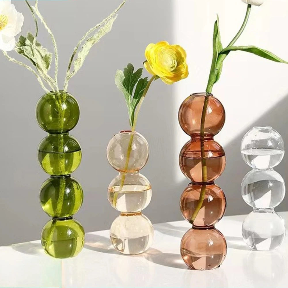 vase verre moderne vert marron transparent sphères empilées décoration intérieure hydroponique arrangement floral