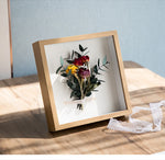 cadres profonds bois clair fleurs séchées coquillages vitre transparente rustique minimaliste