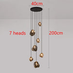 Suspension lumineuse moderne dorée noir formes géométriques brillantes salon chambre