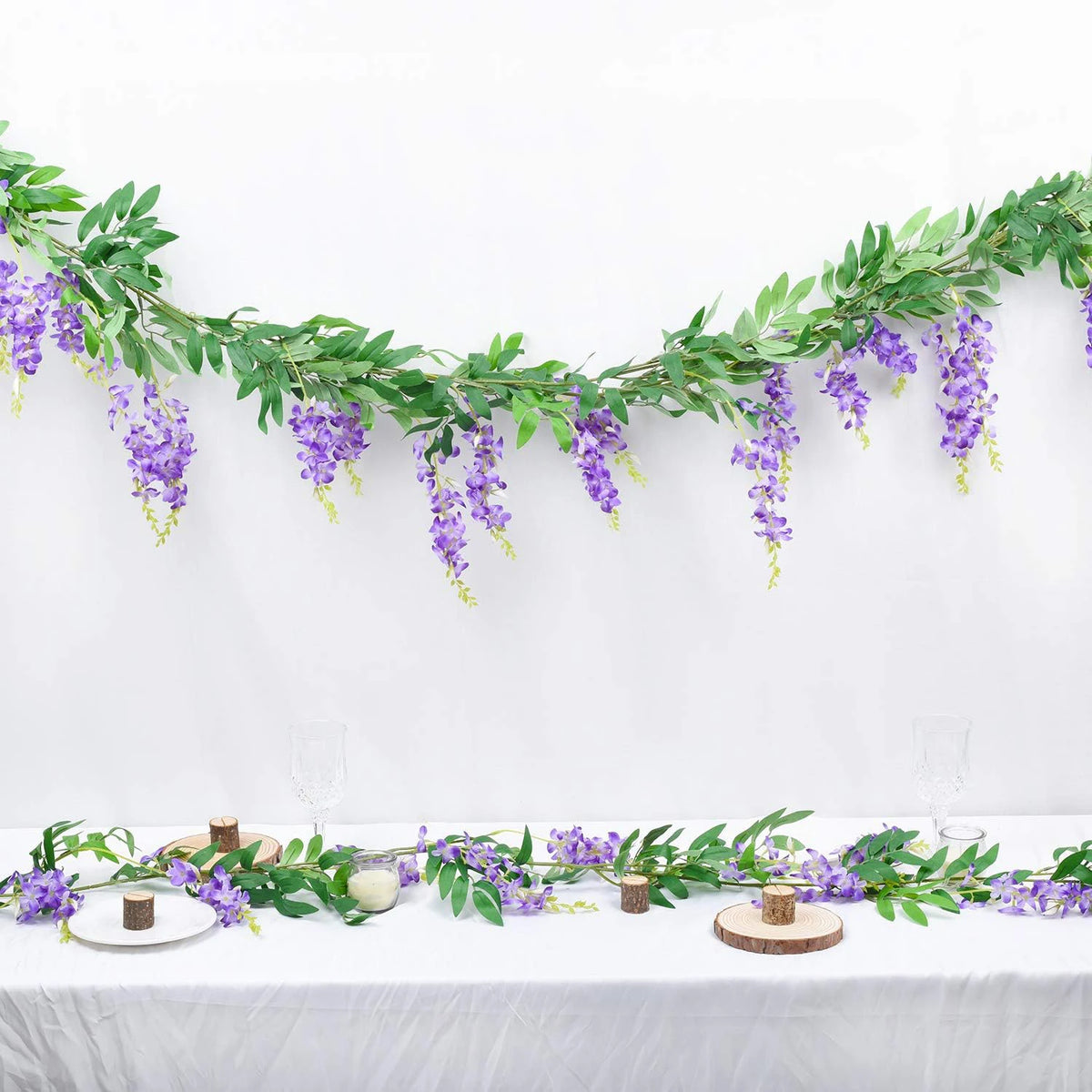 guirlande végétale naturelle fleurs vertes violettes blanches roses extérieur décoration maison jardin mariage festivités
