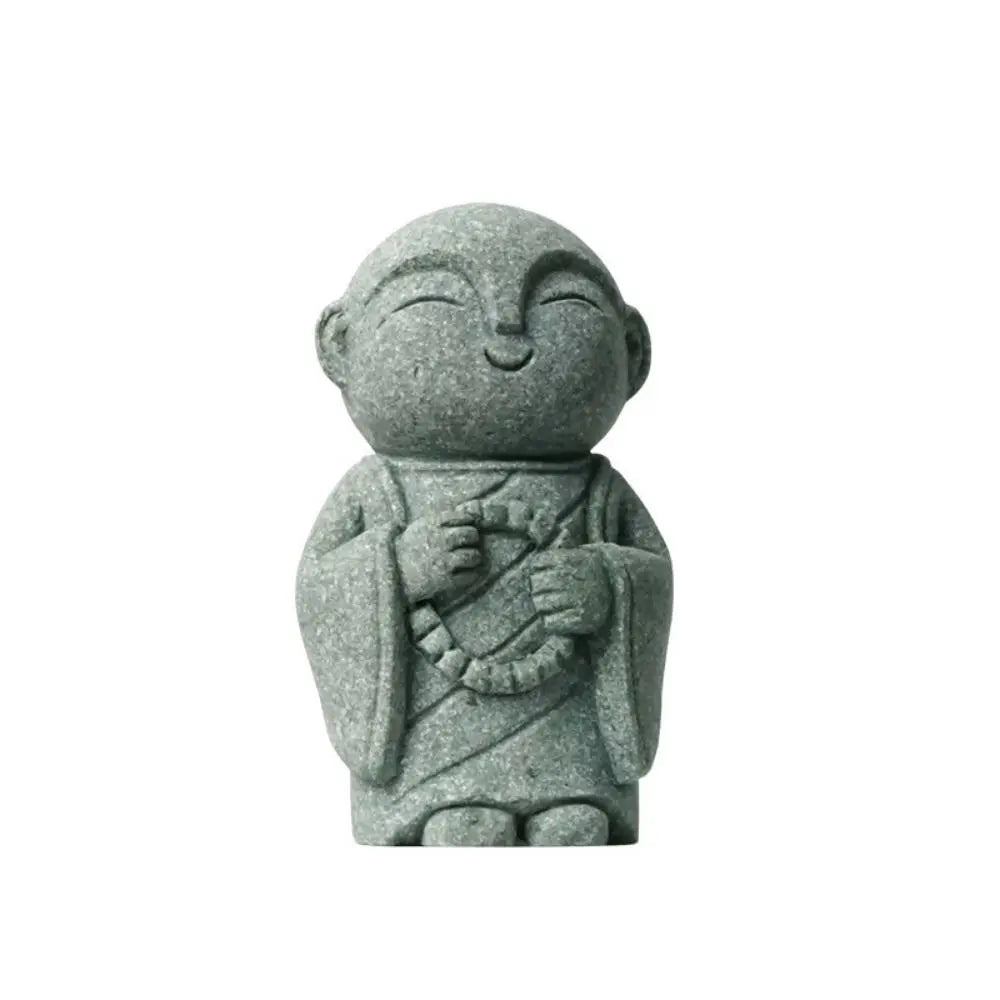 statuette bouddhiste vert clair granitée minimaliste sculptural durable extérieure intérieure ornement jardin porte bonheur