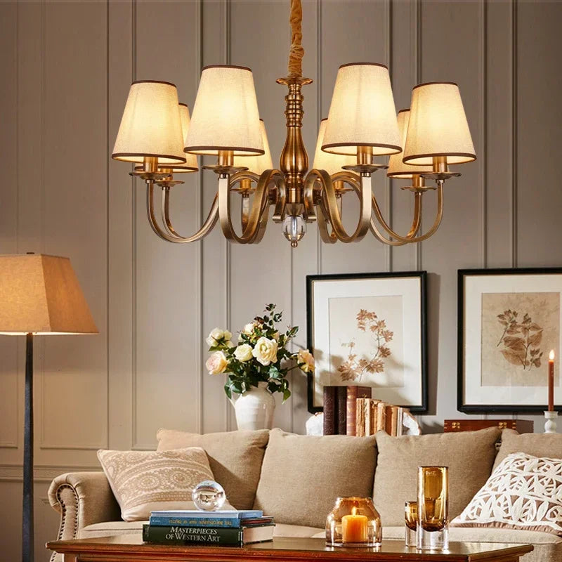 chandelier bronze classique suspension lumière abat jours tissu texturé courbes salle manger