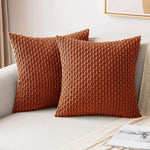 coussins carrés vert clair beige rose pâle texture tissée pompons moderne fermeture glissière