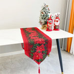 table table noël fleurs poinsettia feuilles vertes bordure dorée classique festif blanc rouge vert