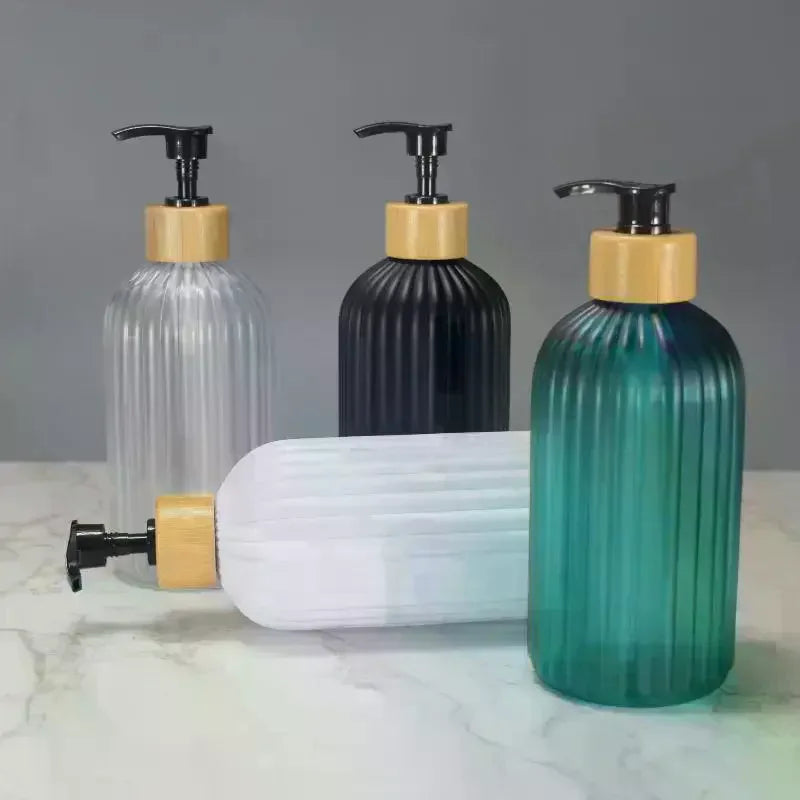 flacon savon liquide moderne rayures vertes pompe pression bouchons dorés vert noir blanc