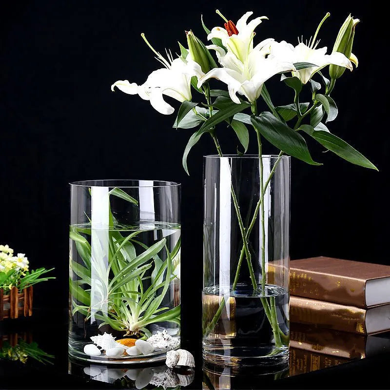vase verre transparent moderne fleurs plantes artificielles coquillages décoration intérieure table salon