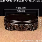 support bois ornements sculptés complexe artisanal marron foncé traditionnel décoration maison objet décoratif stand