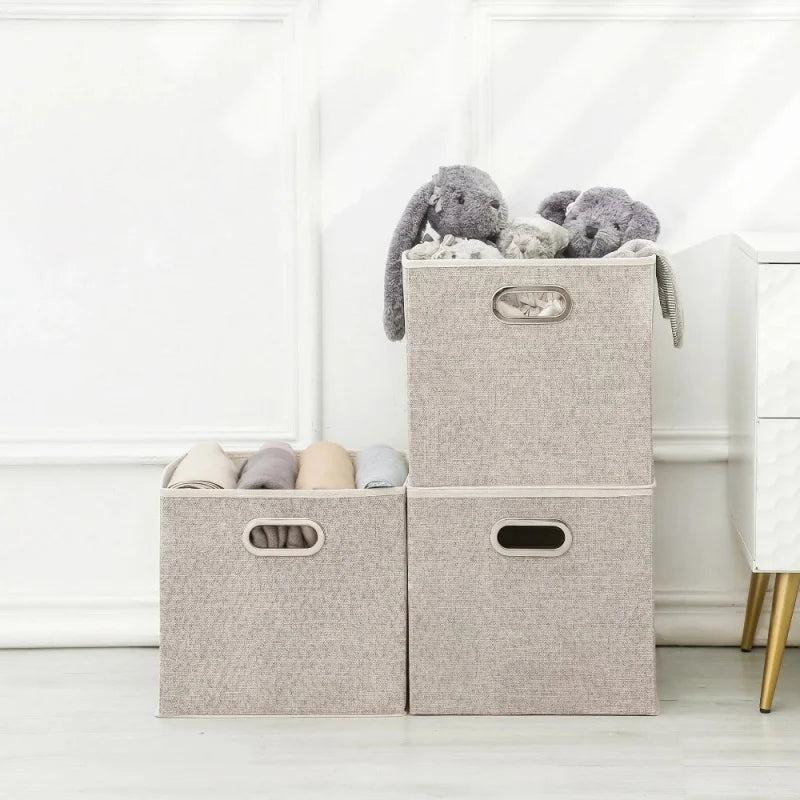 boîtes rangement pliables tissu lin beige poignées métalliques moderne organisation chambre enfants jouets