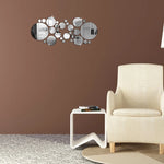 Décoration murale avec autocollants miroir acrylique 3D dans une chambre