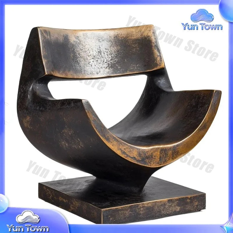 sculptures décoratives abstraites modernes or bronze marron surfaces polies aspect texturé rouille base pierre