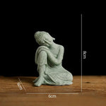statues bouddha vert clair texture marbre classique décoration intérieure zen espace spiritualité pierre socle