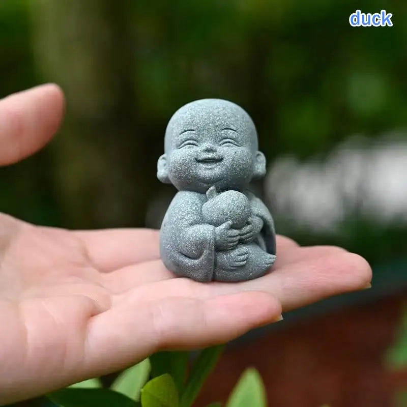 statues moines résine gris texture granulée art artisanal jardin zen serein souriantextérieur decoration