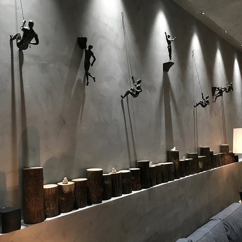 statues suspendues bronze figures humaines mouvement art contemporain décoration intérieure rétro vintage nostalgie