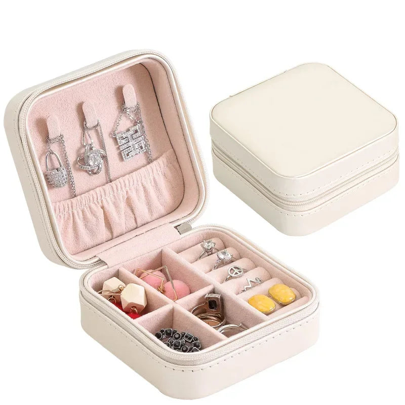 boîte bijoux portable cuir velours beige rose bleu marine moderne élégant boucles oreilles colliers