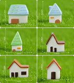décoration miniatures maison blanc brun bleu vert orange toits vagues minimaliste cartoon like