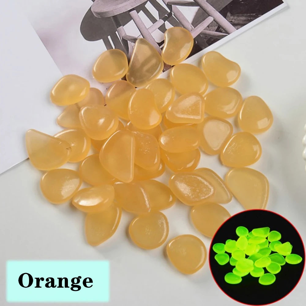 pierres fluorescentes bleu vert jaune rose modernes lisses jardin patio décor lumineux