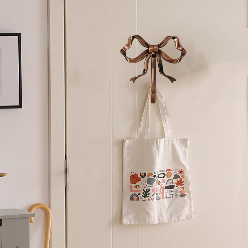 porte sacs décoratif or ruban noeud argent bronze opacité vintage