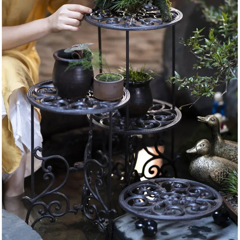 support plantes art nouveau ornements floraux noir paniers osier pots fleurs salon balcon
