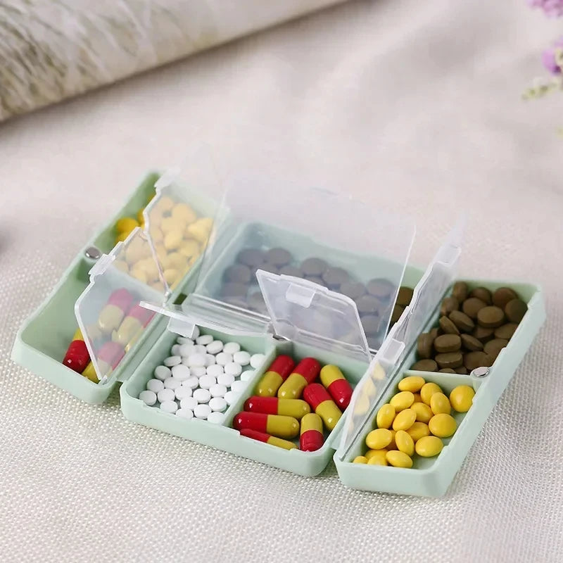 boîte pilules hebdomadaire compartiments couleurs pastel croix blanche moderne pratique
