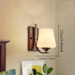 lampe murale classique bronze foncé abat jour blanc verre opaque éclairage intérieur ambiance chambre
