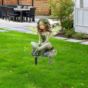 statue fée pierre détails floraux vert beige gris artisanale réaliste jardin extérieur