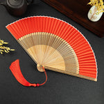 éventail traditionnel violetclair noir rouge vertpastel soie bambou rayures horizontales pompon