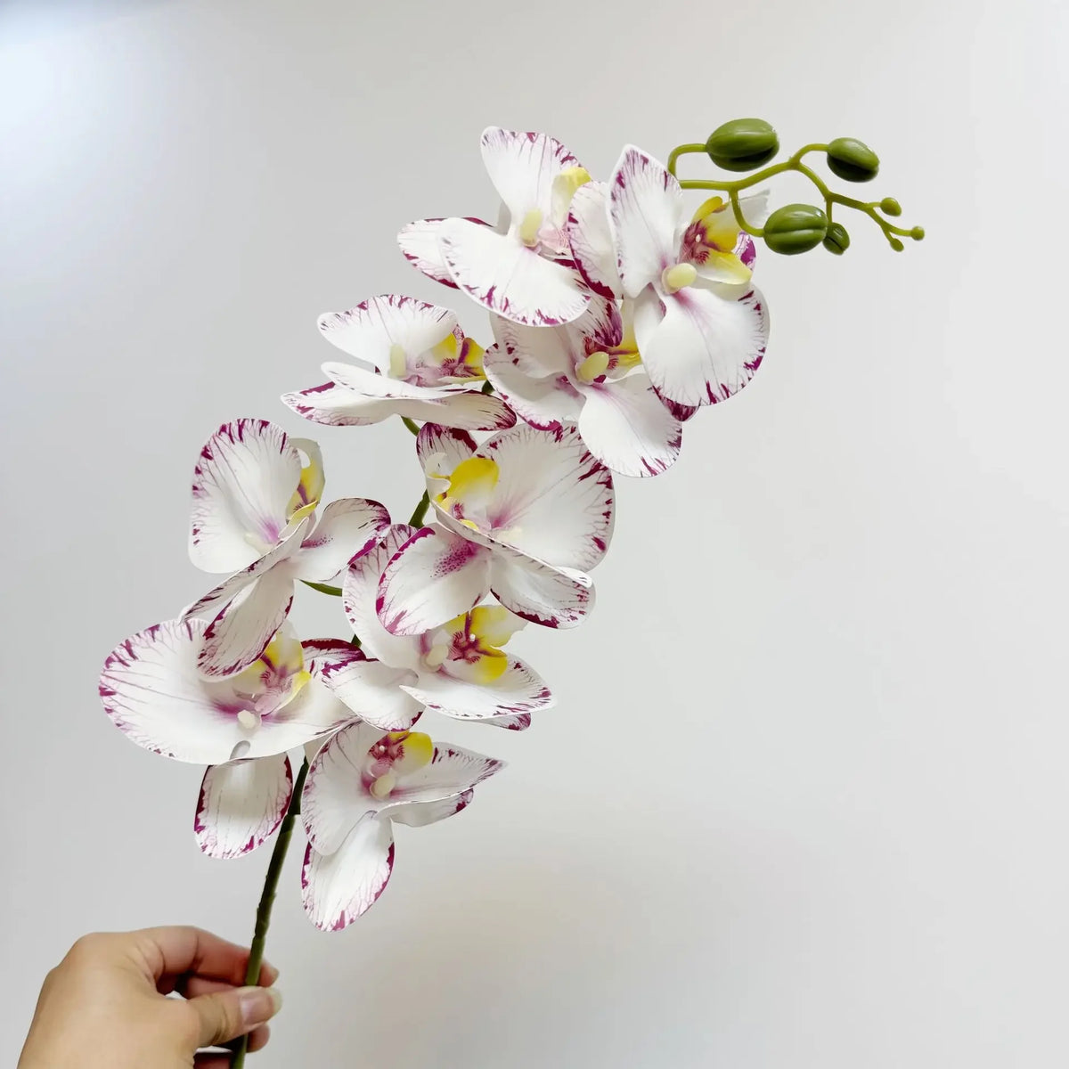 décoration intérieure vase orchidées artificielles fleurs douces feuilles vertes moderne élégant rose blanc violet